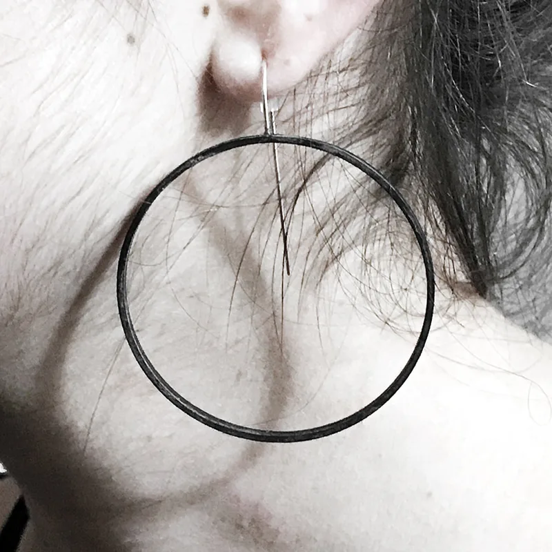 Big Circle Slice Earrings in black brass
