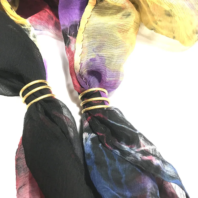coil-rings-vermeil-on-scarf