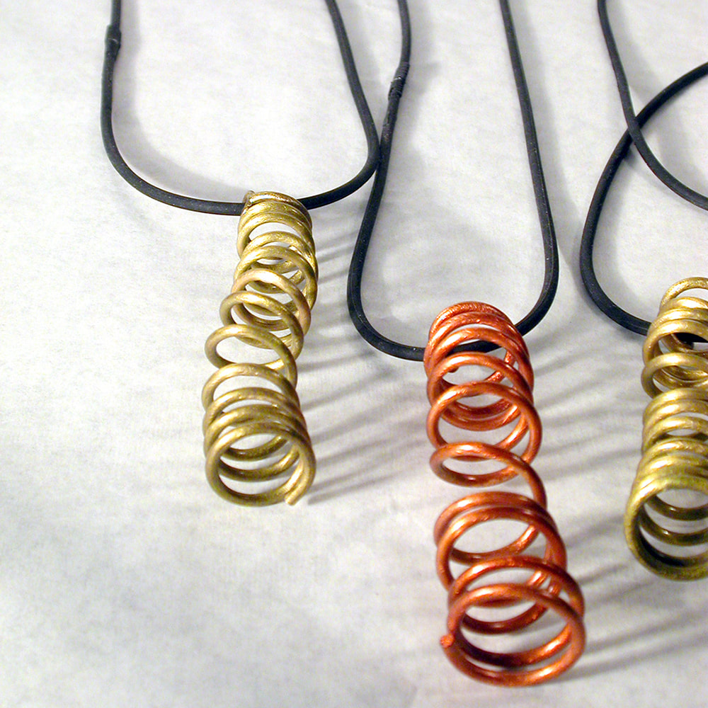 Coil pendants