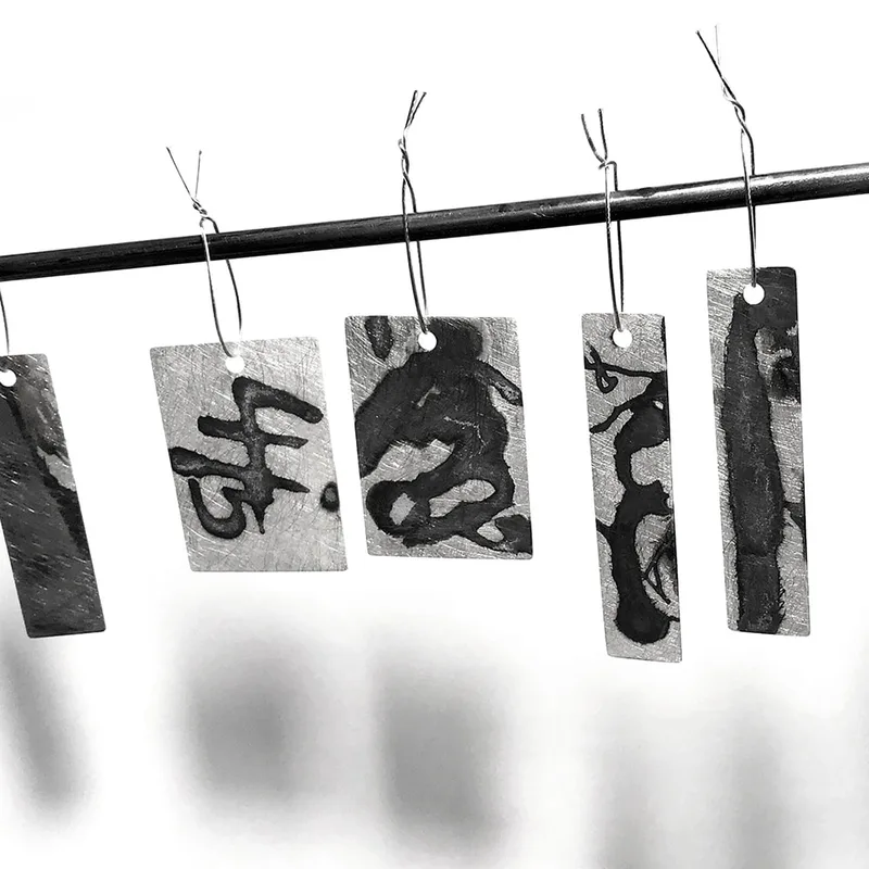 Black and White jewelry work in progress - all sealed and hung to dry