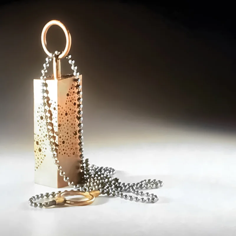 Lightheartedly Pendant 15 - pierced brass, oxidized sterling silver bead chain - private collection, San Francisco/CA
