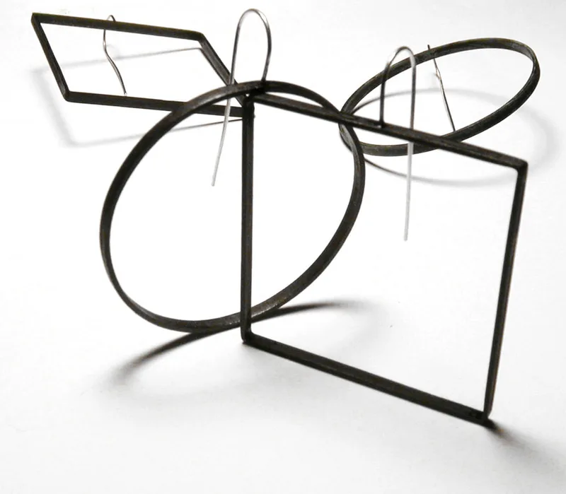 the big squares and circles in black brass